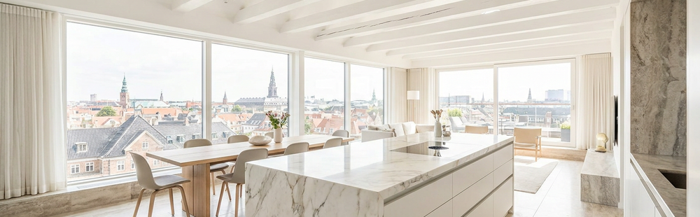 Penthouse residence with marble kitchen, bright rooftop views and refined furniture