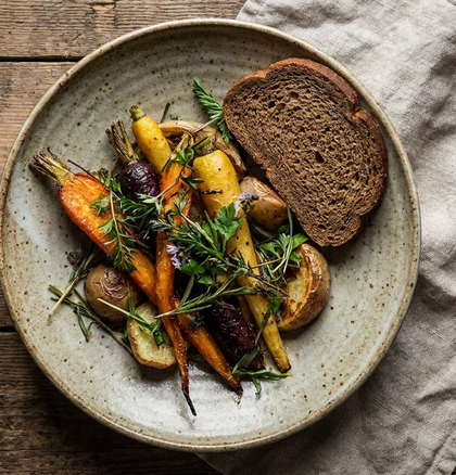 Seasonal Nordic meal on a ceramic plate